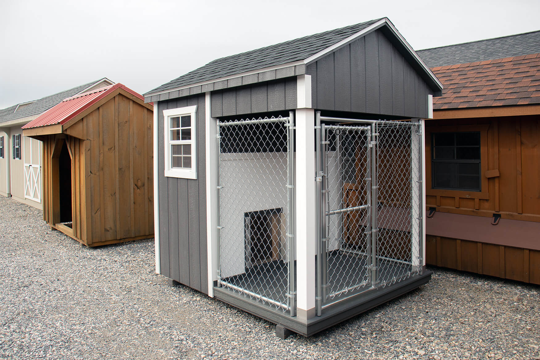 Gray in-stock dog kennel for sale on the Penn Dutch Structures lot in Shrewsbury, PA