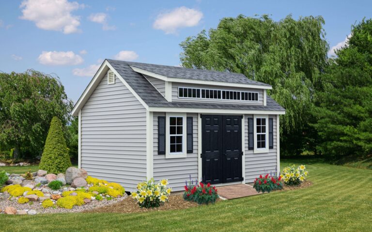 amish built grey shed in a yard